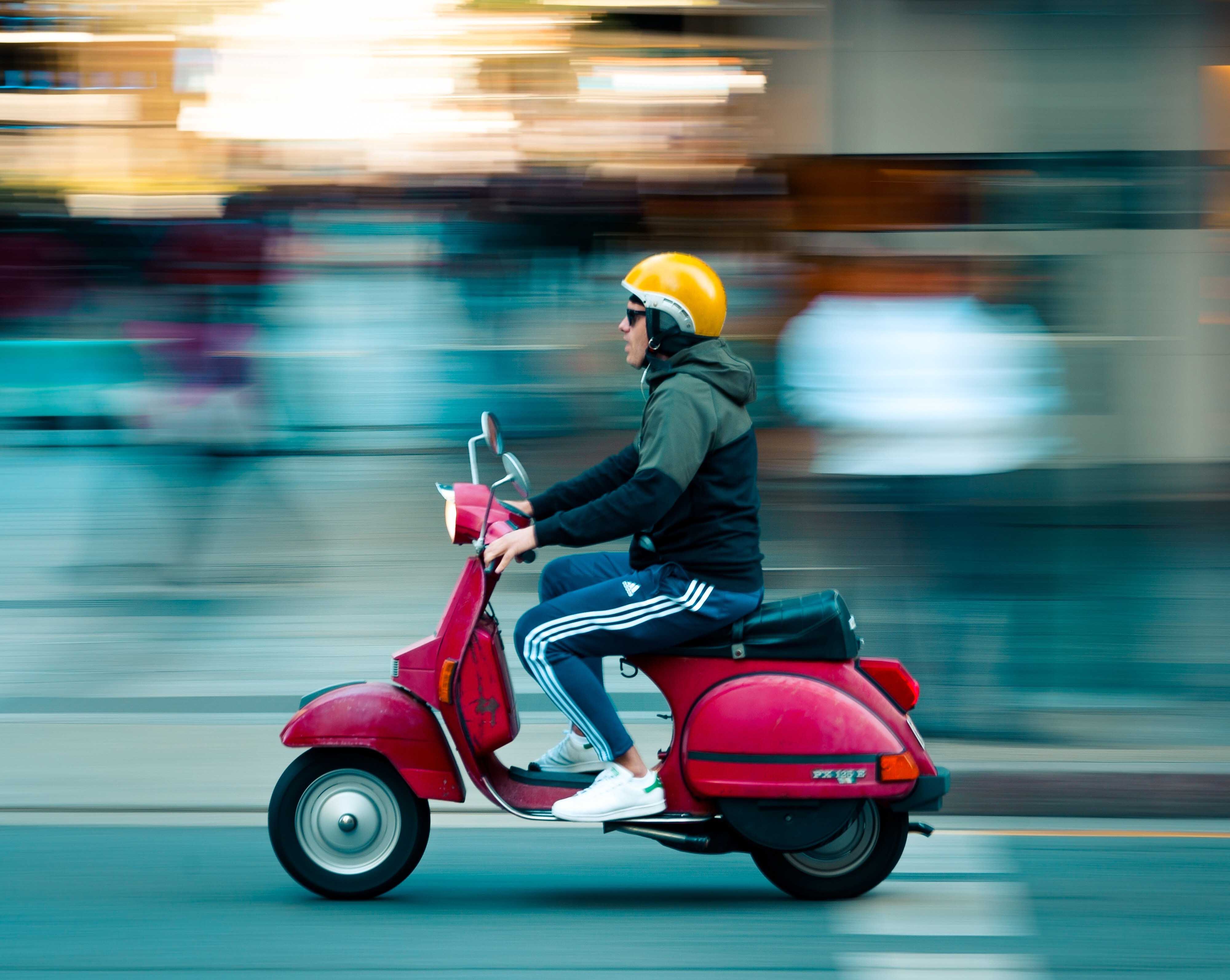 Man-On-Red-Scooter-Vector-X